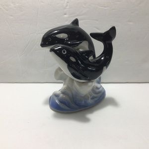 TWO CERAMIC PLAYFUL DOLPHINS